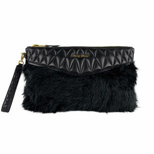Miu MIu clutch bag leather fur black